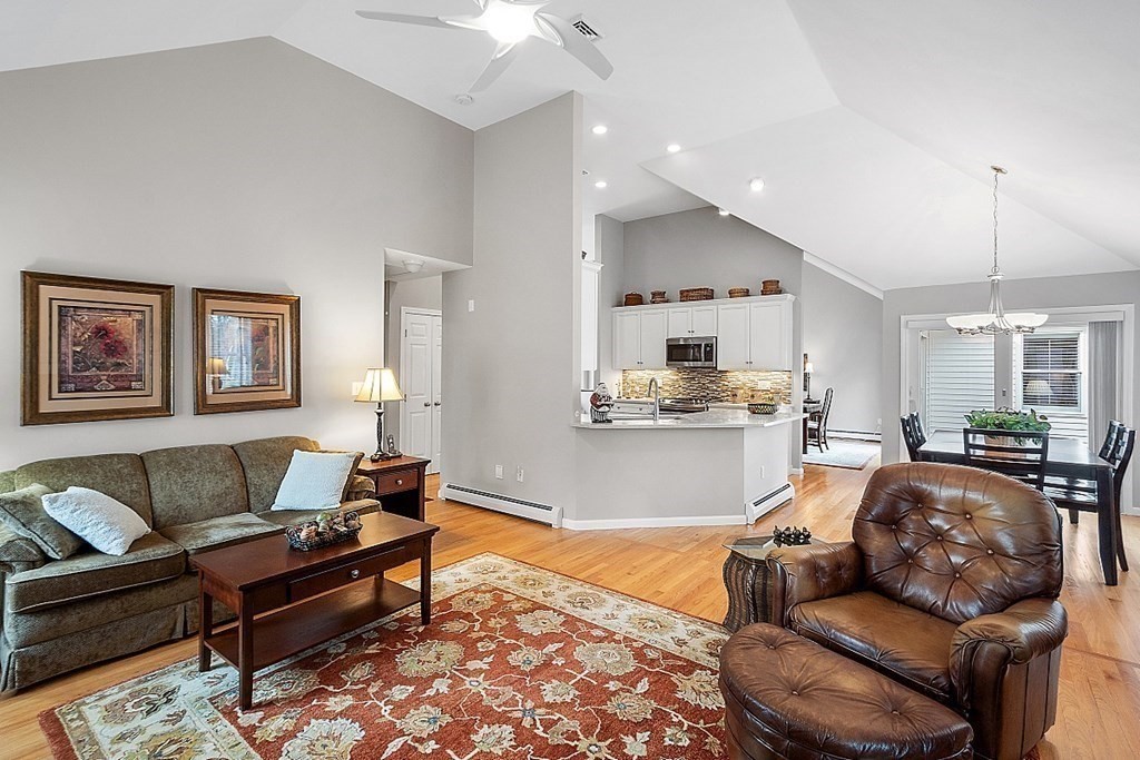 9 Joco Drive Tyngsborough, MA 01879 - Photo 18 of 38 a living room with furniture and kitchen view