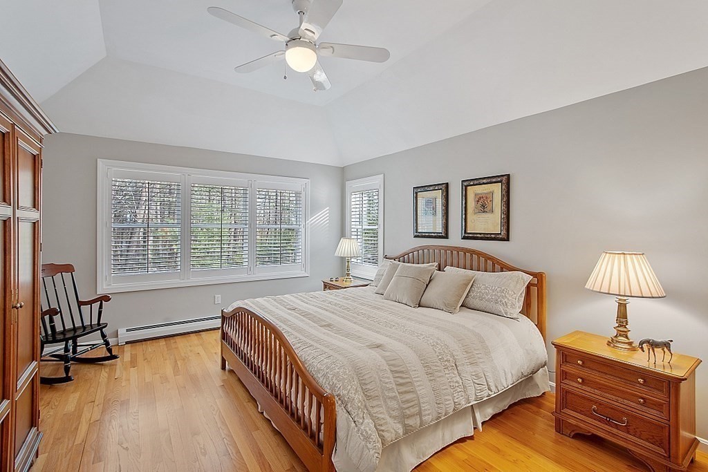 9 Joco Drive Tyngsborough, MA 01879 - Photo 19 of 38 a bedroom with a bed and a large window