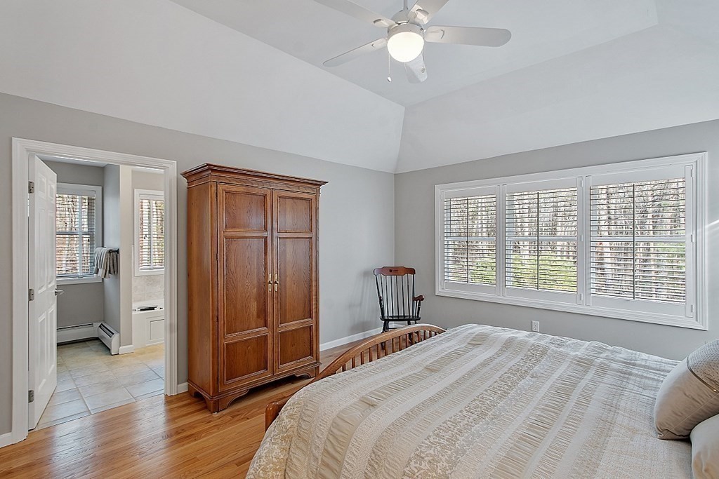 9 Joco Drive Tyngsborough, MA 01879 - Photo 21 of 38 a bedroom with a bed and a large window