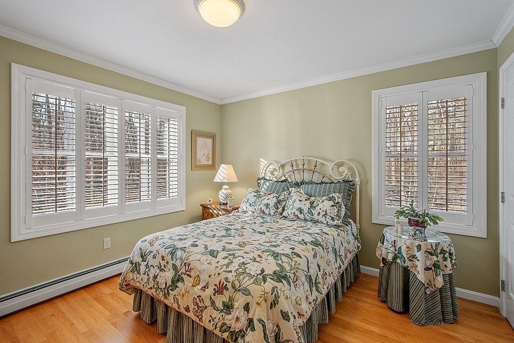 9 Joco Drive Tyngsborough, MA 01879 - Photo 23 of 38 a bed sitting in a bedroom next to a window
