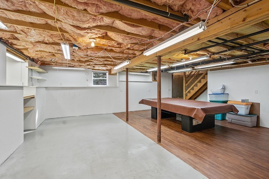 9 Joco Drive Tyngsborough, MA 01879 - Photo 27 of 38 a room with wooden furniture and windows