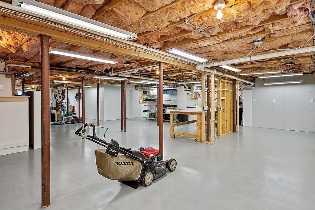 9 Joco Drive Tyngsborough, MA 01879 - Photo 29 of 38 a view of a room with gym equipment
