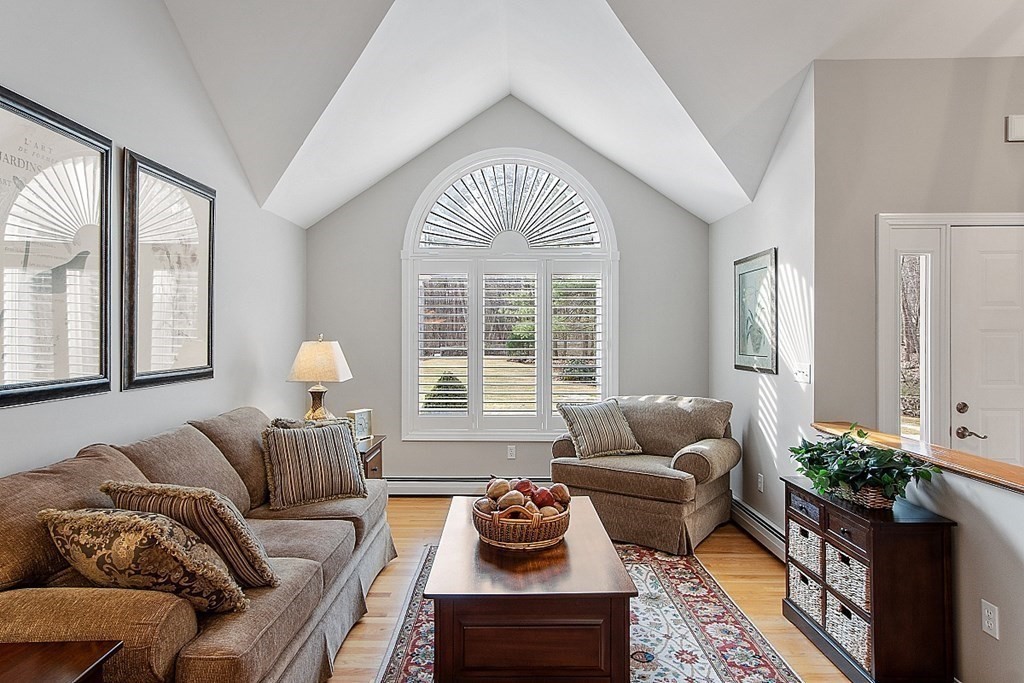 9 Joco Drive Tyngsborough, MA 01879 - Photo 5 of 38 a living room with furniture and a large window