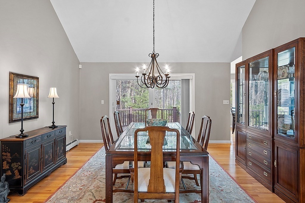 9 Joco Drive Tyngsborough, MA 01879 - Photo 8 of 38 a view of a dining room with furniture window and wooden floor