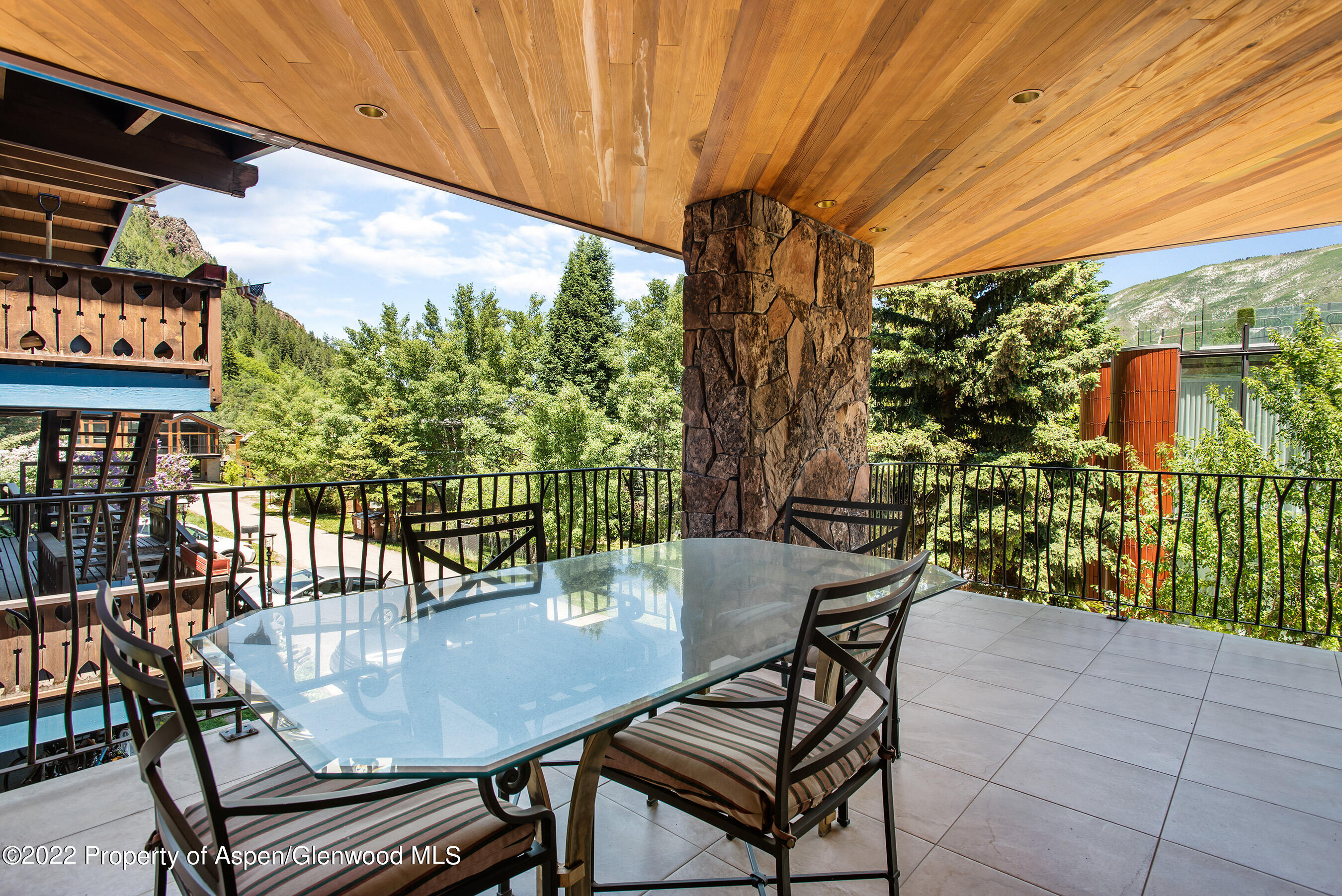 237 Gilbert Street Aspen, CO 81611 - Photo 15 of 28 a outdoor dining space with furniture and outdoor view