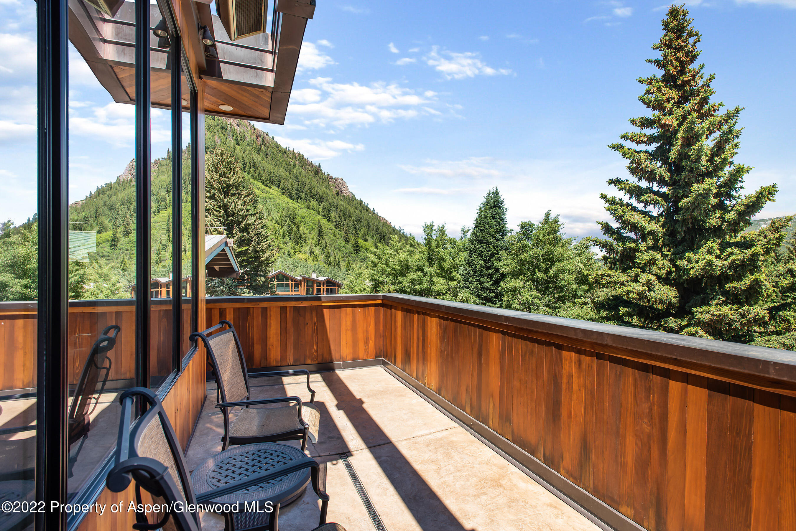 237 Gilbert Street Aspen, CO 81611 - Photo 6 of 28 a view of a balcony with chairs