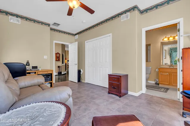 a bathroom with a sink toilet tub and shower
