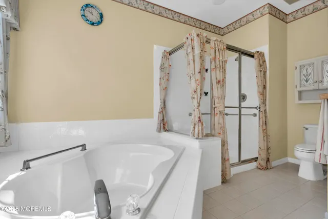 a kitchen with stainless steel appliances granite countertop a stove sink and cabinets