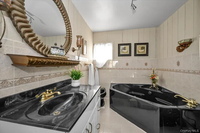 a kitchen that has a sink and a stove