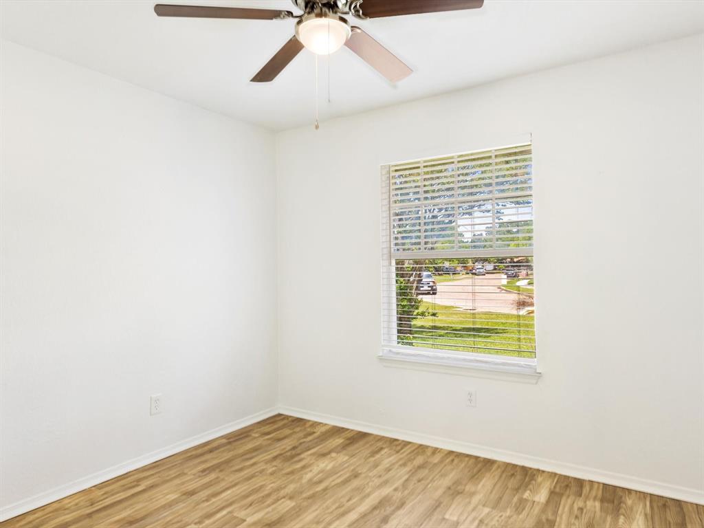 6702 Umphress Road Dallas, TX 75217 - Photo 14 of 22 a view of an empty room with a window