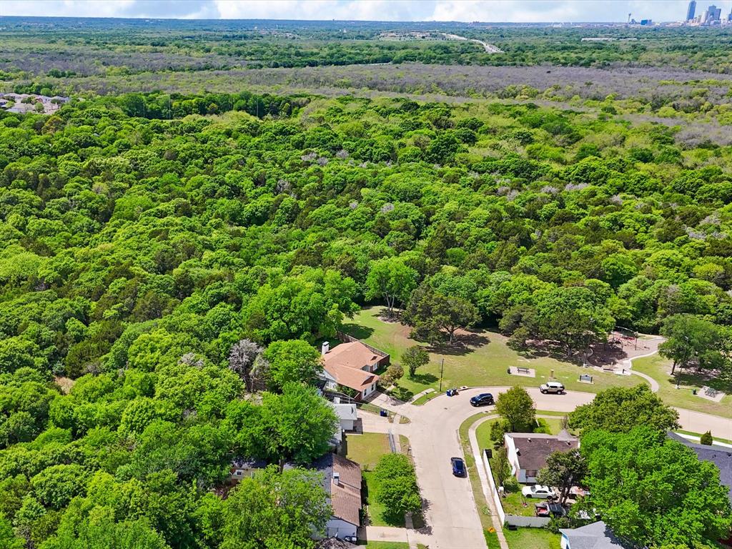 6702 Umphress Road Dallas, TX 75217 - Photo 21 of 22 an aerial view of a house with a yard and outdoor seating
