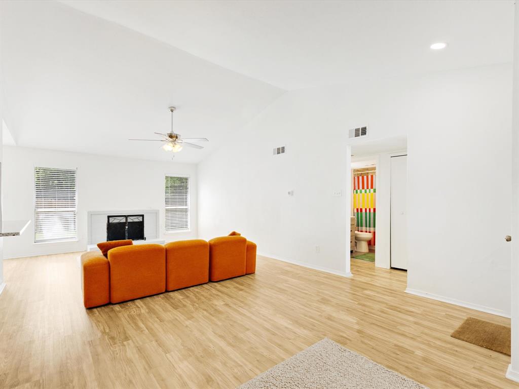 6702 Umphress Road Dallas, TX 75217 - Photo 7 of 22 a view of a livingroom with furniture window and wooden floor