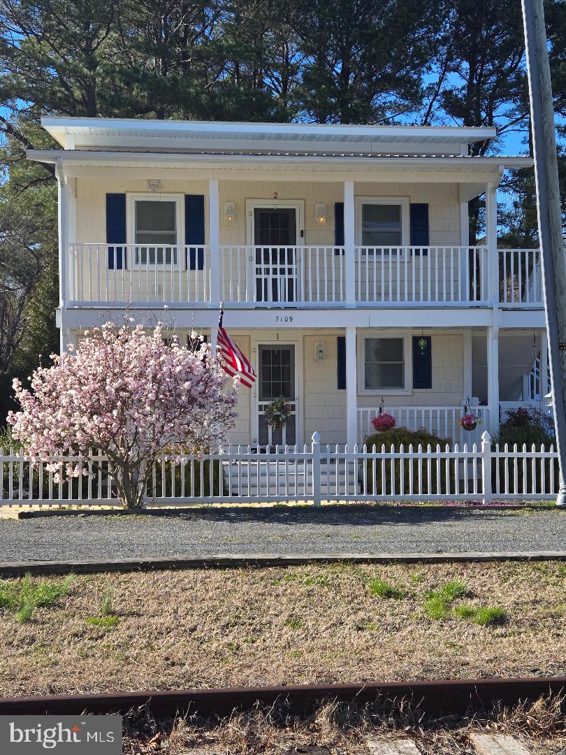 front view of a house with a porch