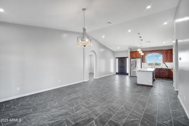 a view of a building stairs and a hallway