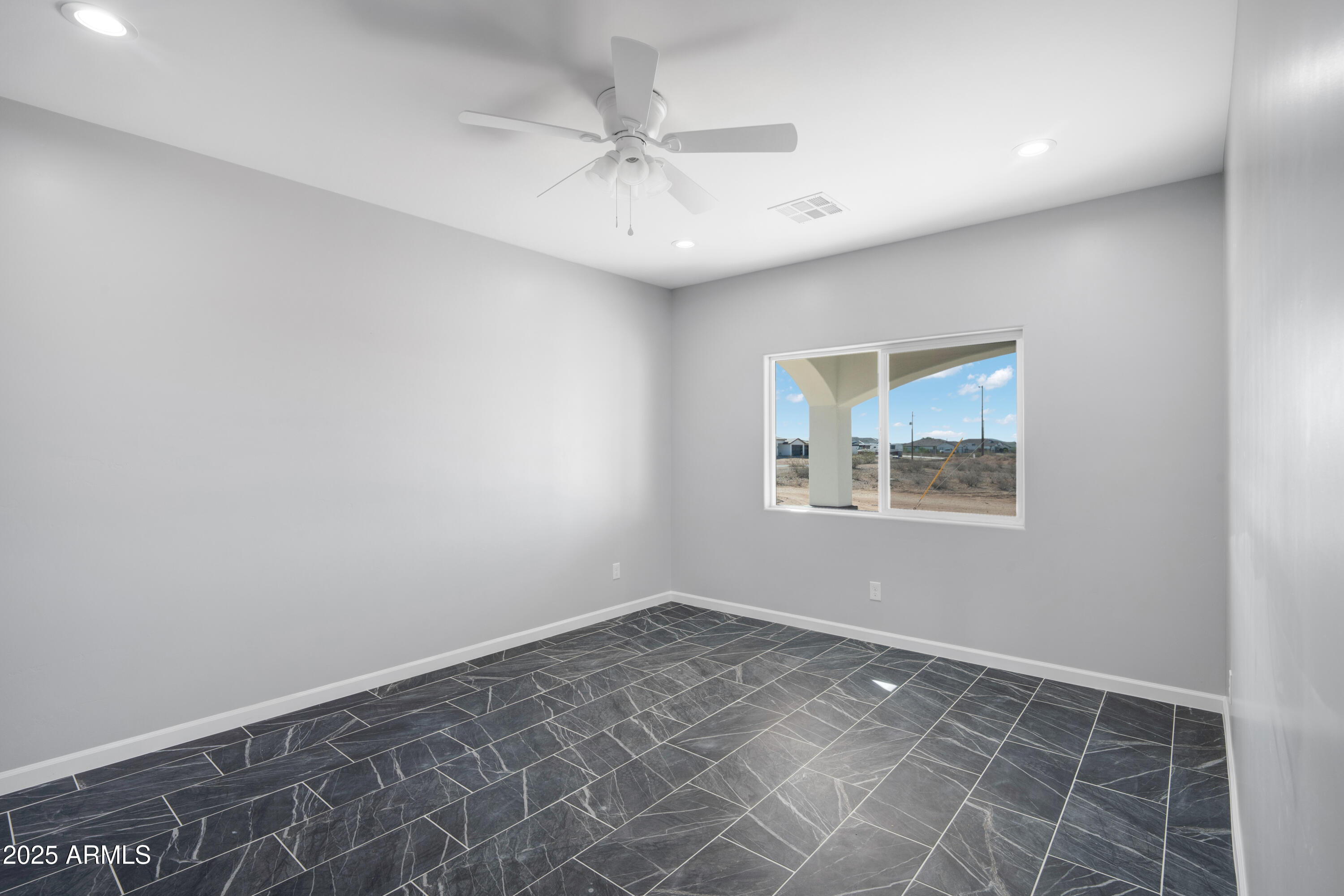 35532 West Chipman Road Tonopah, AZ 85354 - Photo 19 of 30 an empty room with a window