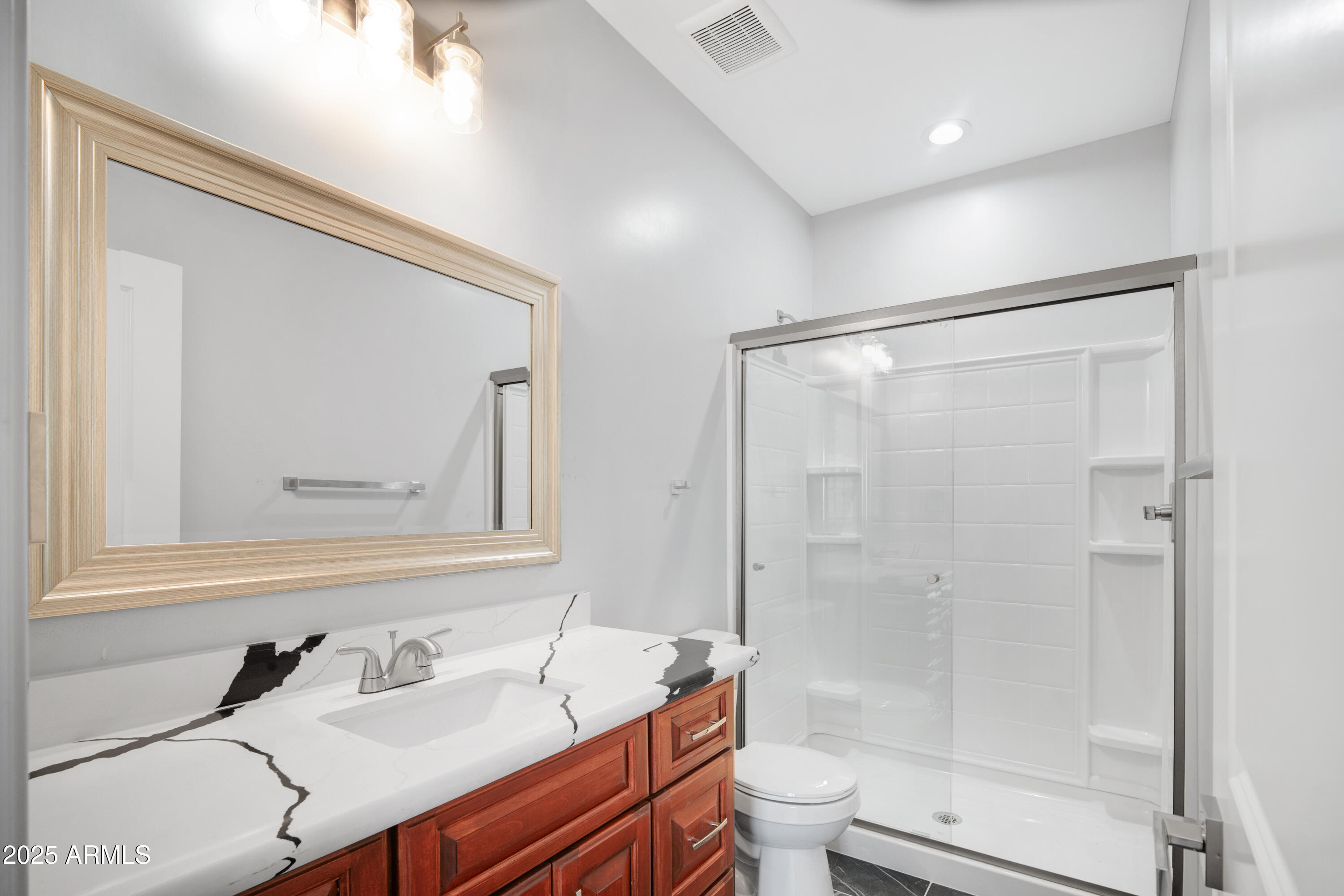 35532 West Chipman Road Tonopah, AZ 85354 - Photo 20 of 30 a bathroom with a sink and a mirror