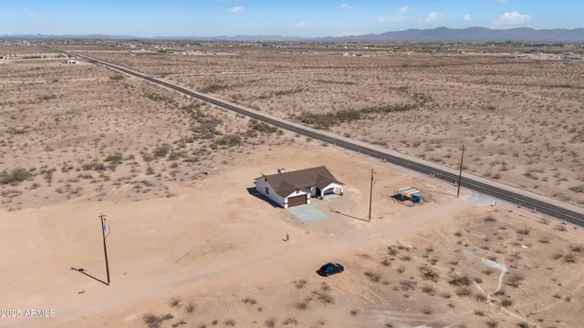 a view of ocean and mountain