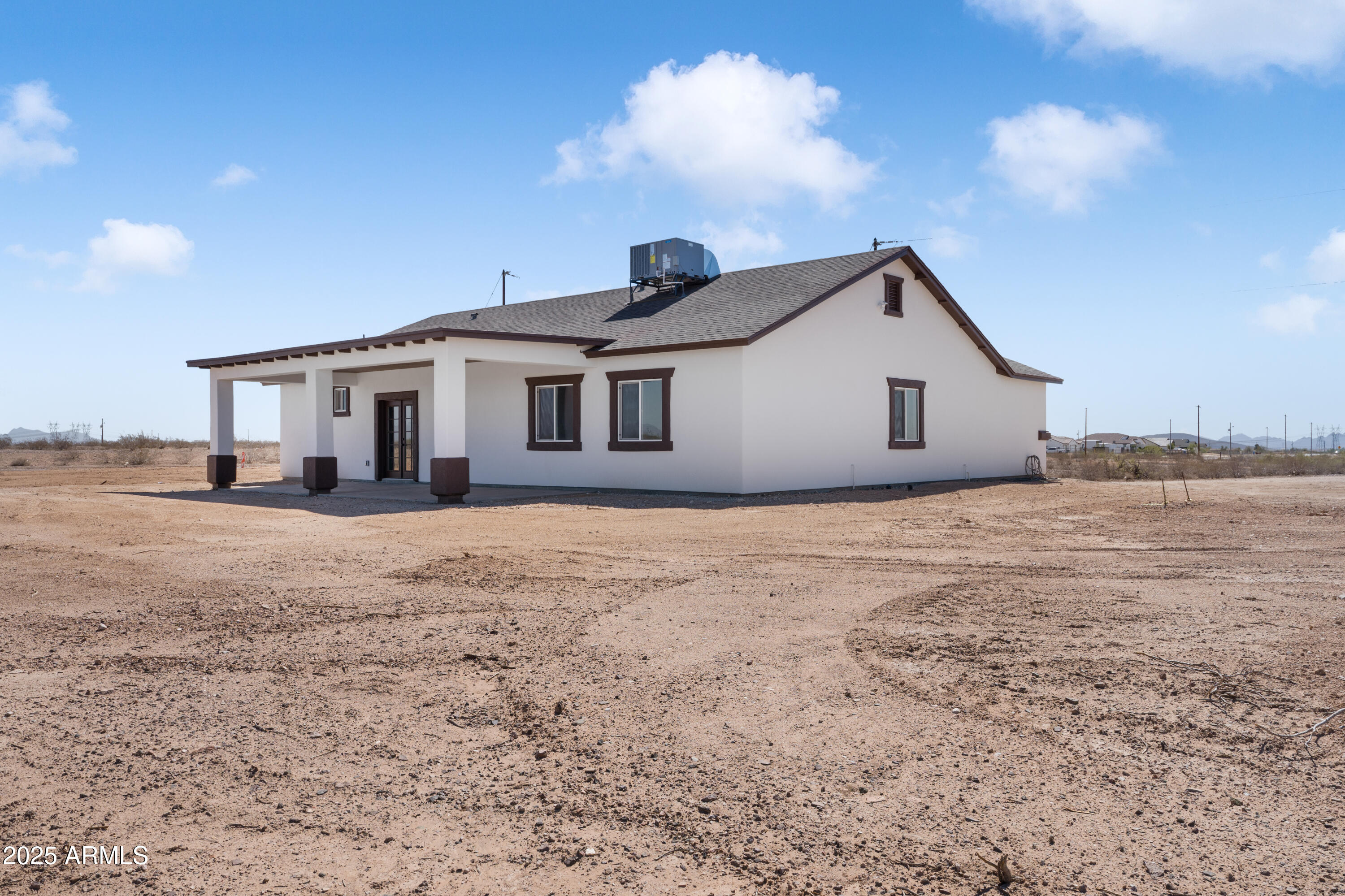 35532 West Chipman Road Tonopah, AZ 85354 - Photo 6 of 30 a view of house with yard and entertaining space