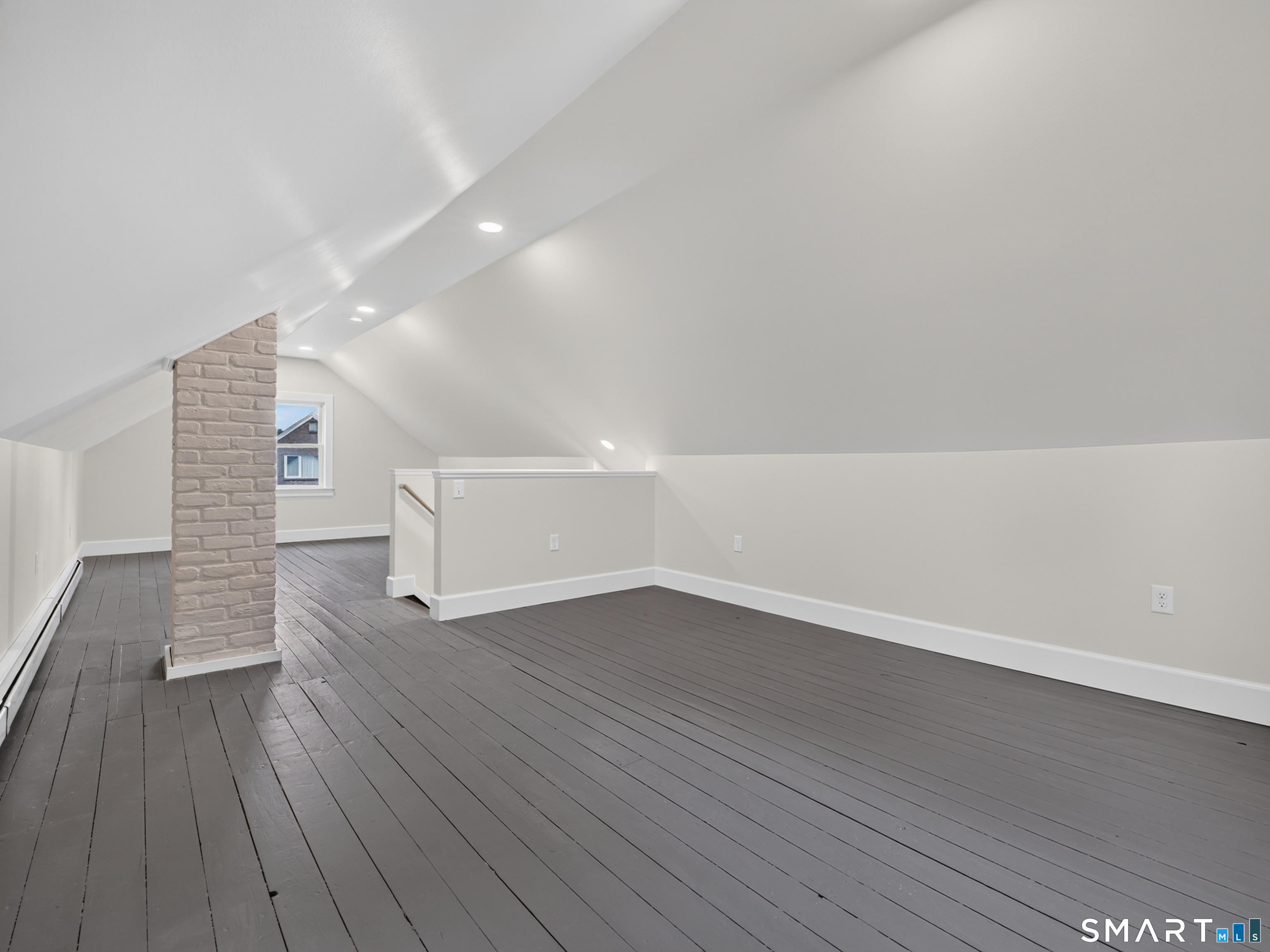 1039 N Road Groton, CT 06340 - Photo 20 of 26 a view of empty room with wooden floor