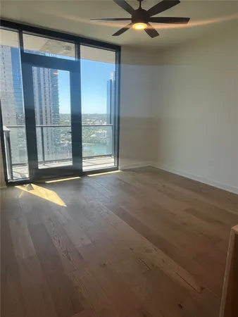 a view of an empty room with a window