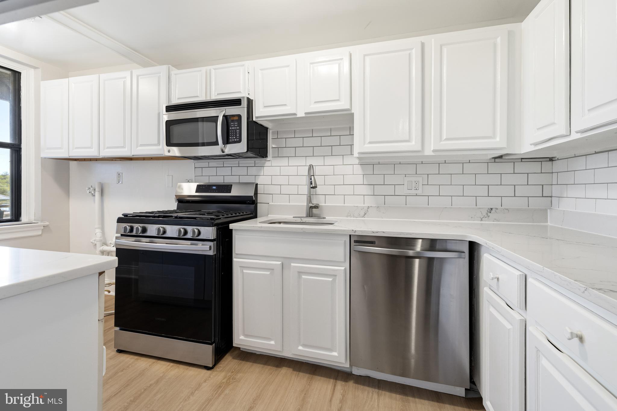 900 Valley Road, Unit A202 Melrose Park, PA 19027 - Photo 17 of 29 Stainless steel appliances in kitchen