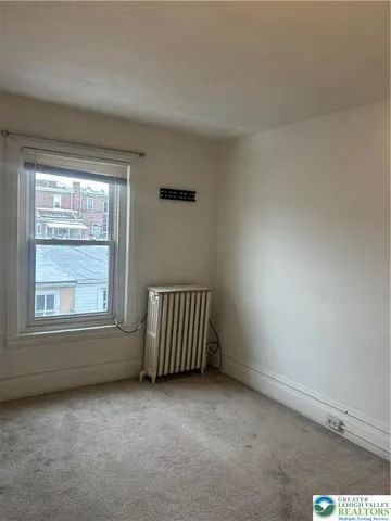 an empty room with a window