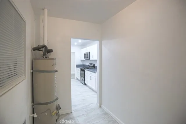 a bathroom with a sink and mirror