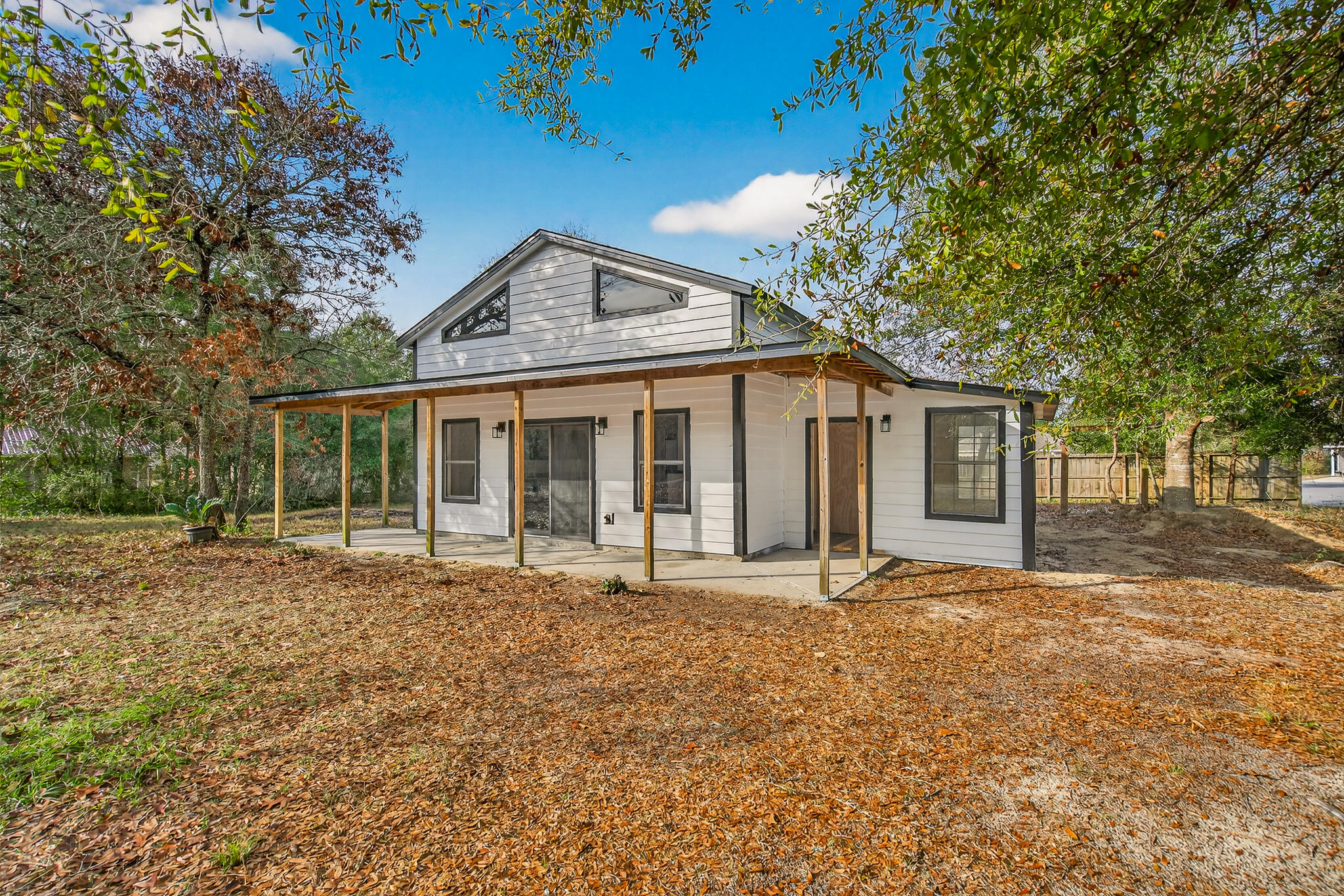 105 East Renoir Road DeFuniak Springs, FL 32433 - Photo 2 of 29 front view of a house with a porch
