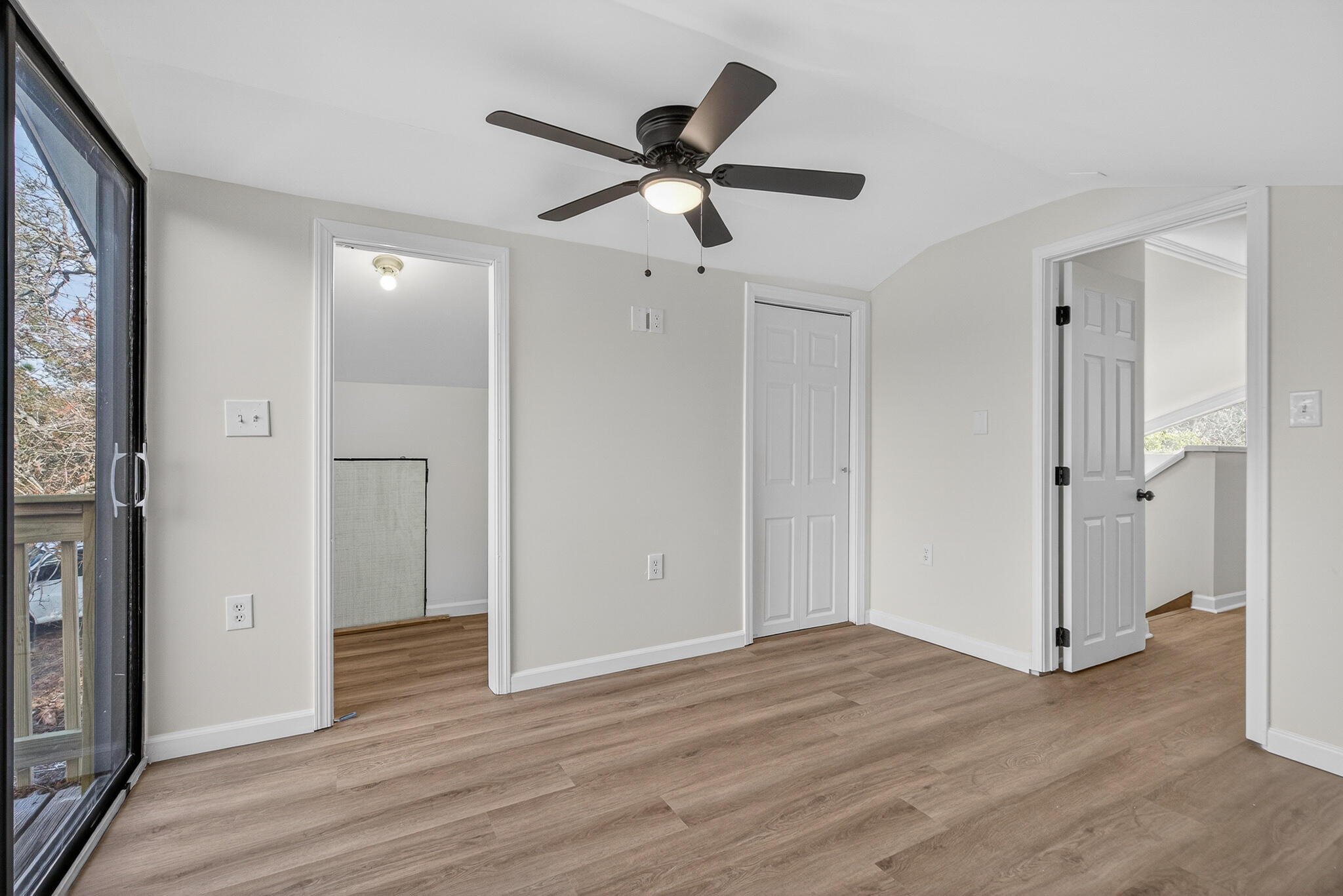 105 East Renoir Road DeFuniak Springs, FL 32433 - Photo 23 of 29 a view of empty room with wooden floor and ceiling fan