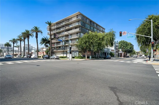 a view of a street with a building in the background