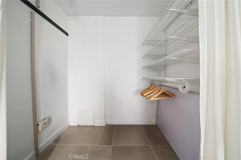 375 Atlantic Avenue, Unit 201 Long Beach, CA 90802 - Photo 18 of 21 a view of walk in closet