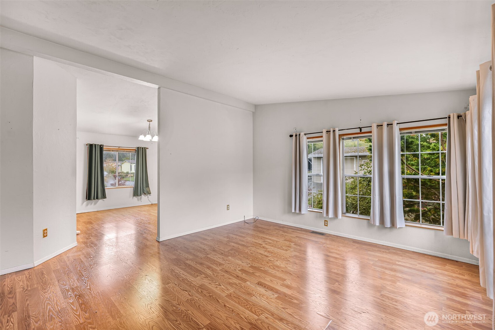 2015 24th Street, Unit 101 Bellingham, WA 98225 - Photo 16 of 40 wooden floor in an empty room with a window