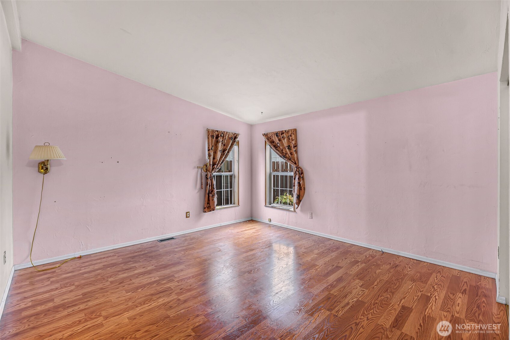 2015 24th Street, Unit 101 Bellingham, WA 98225 - Photo 24 of 40 a view of an empty room with wooden floor and a window