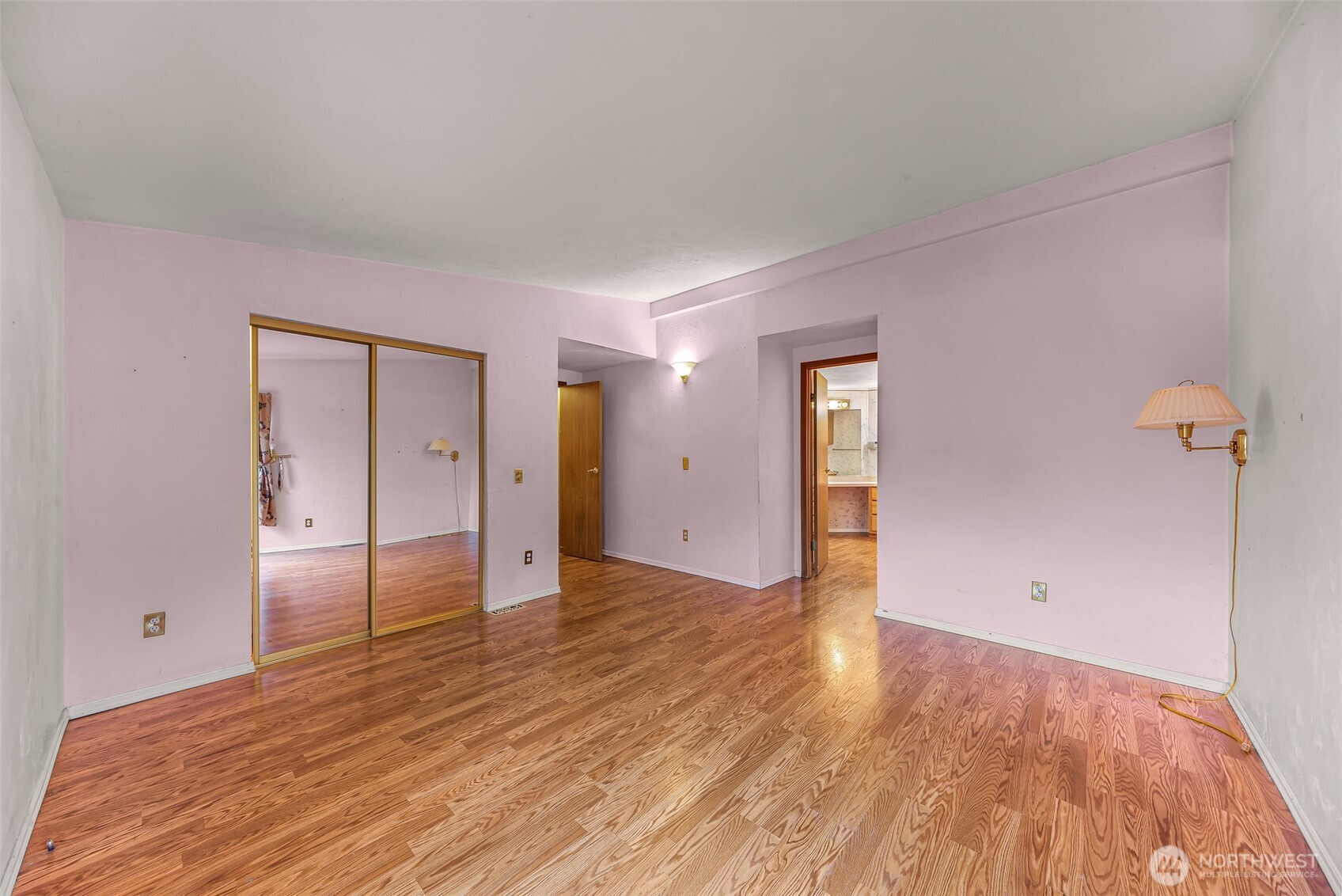 2015 24th Street, Unit 101 Bellingham, WA 98225 - Photo 25 of 40 a view of empty room with wooden floor and fan