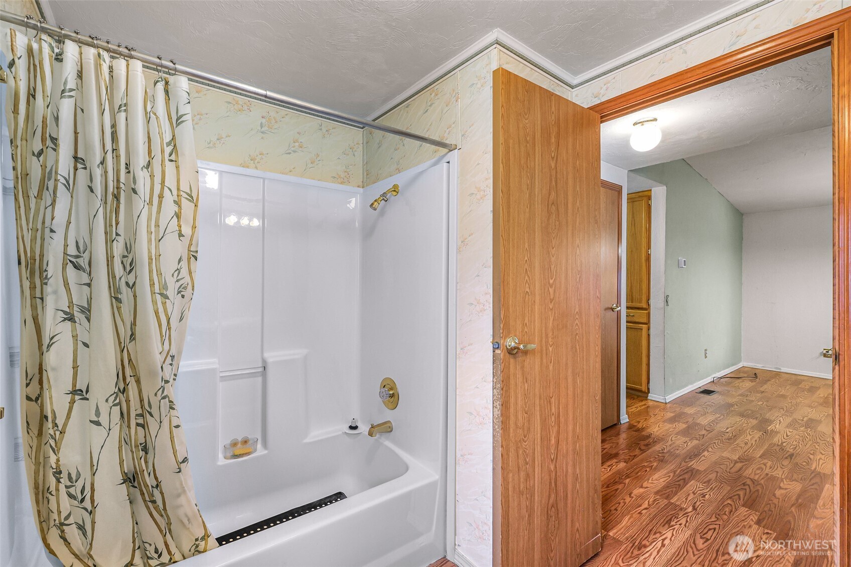 2015 24th Street, Unit 101 Bellingham, WA 98225 - Photo 30 of 40 a bathroom with a bathtub and shower
