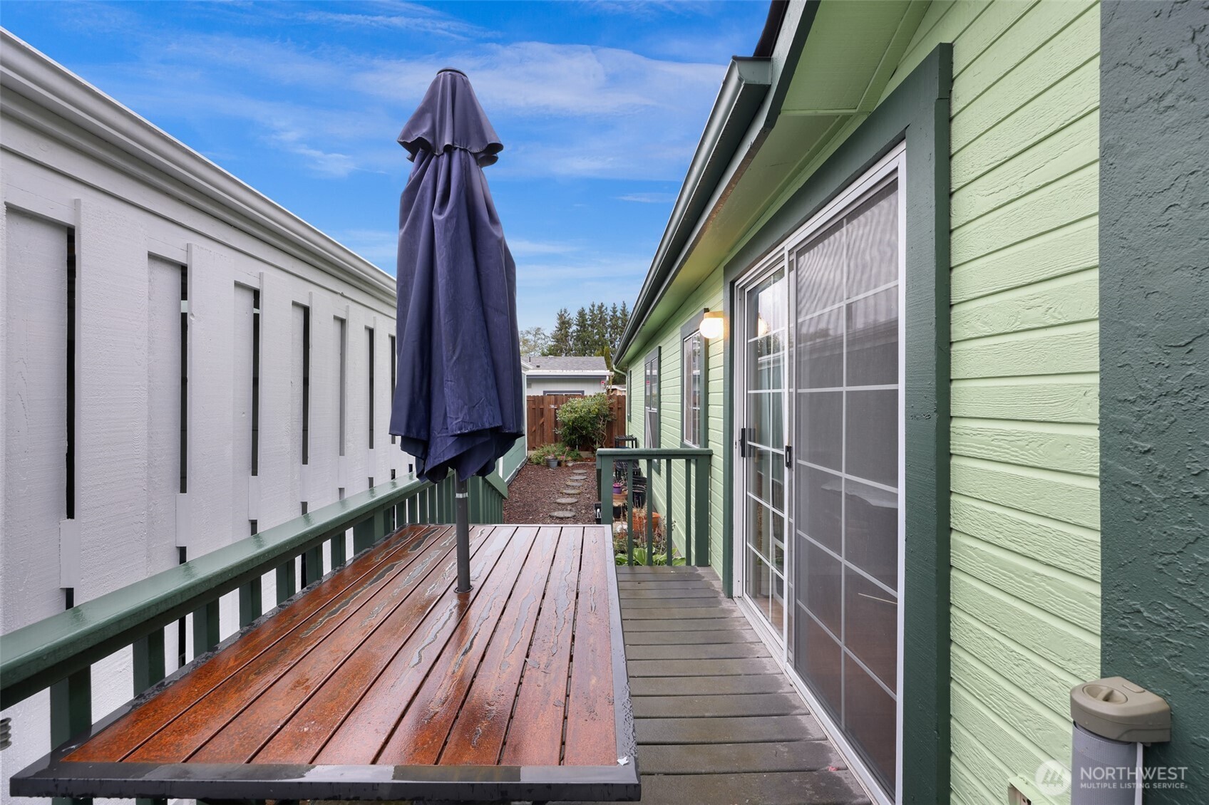 2015 24th Street, Unit 101 Bellingham, WA 98225 - Photo 36 of 40 a view of balcony with wooden floor