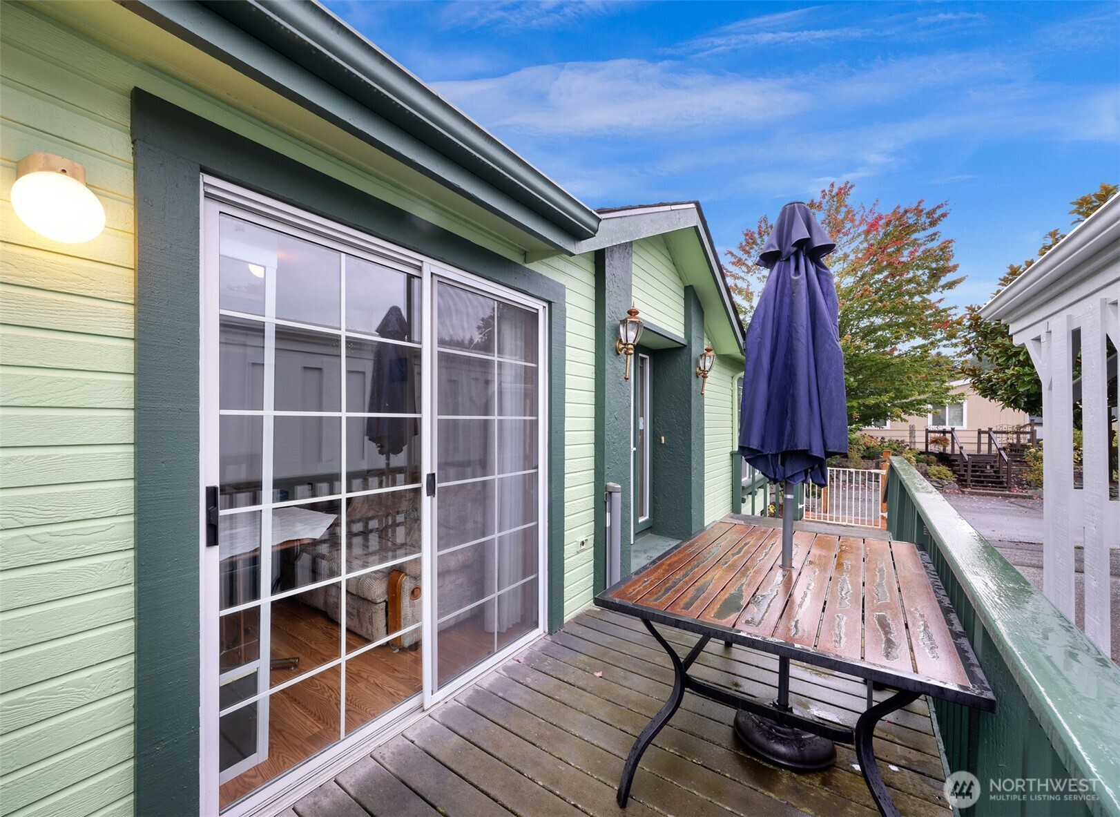 2015 24th Street, Unit 101 Bellingham, WA 98225 - Photo 37 of 40 a view of balcony with wooden floor and seating space
