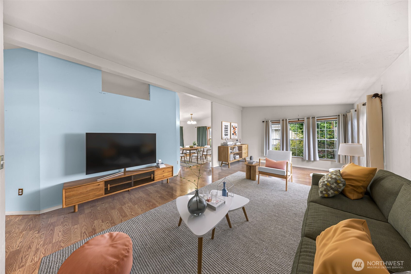 2015 24th Street, Unit 101 Bellingham, WA 98225 - Photo 5 of 40 a living room with furniture and a flat screen tv