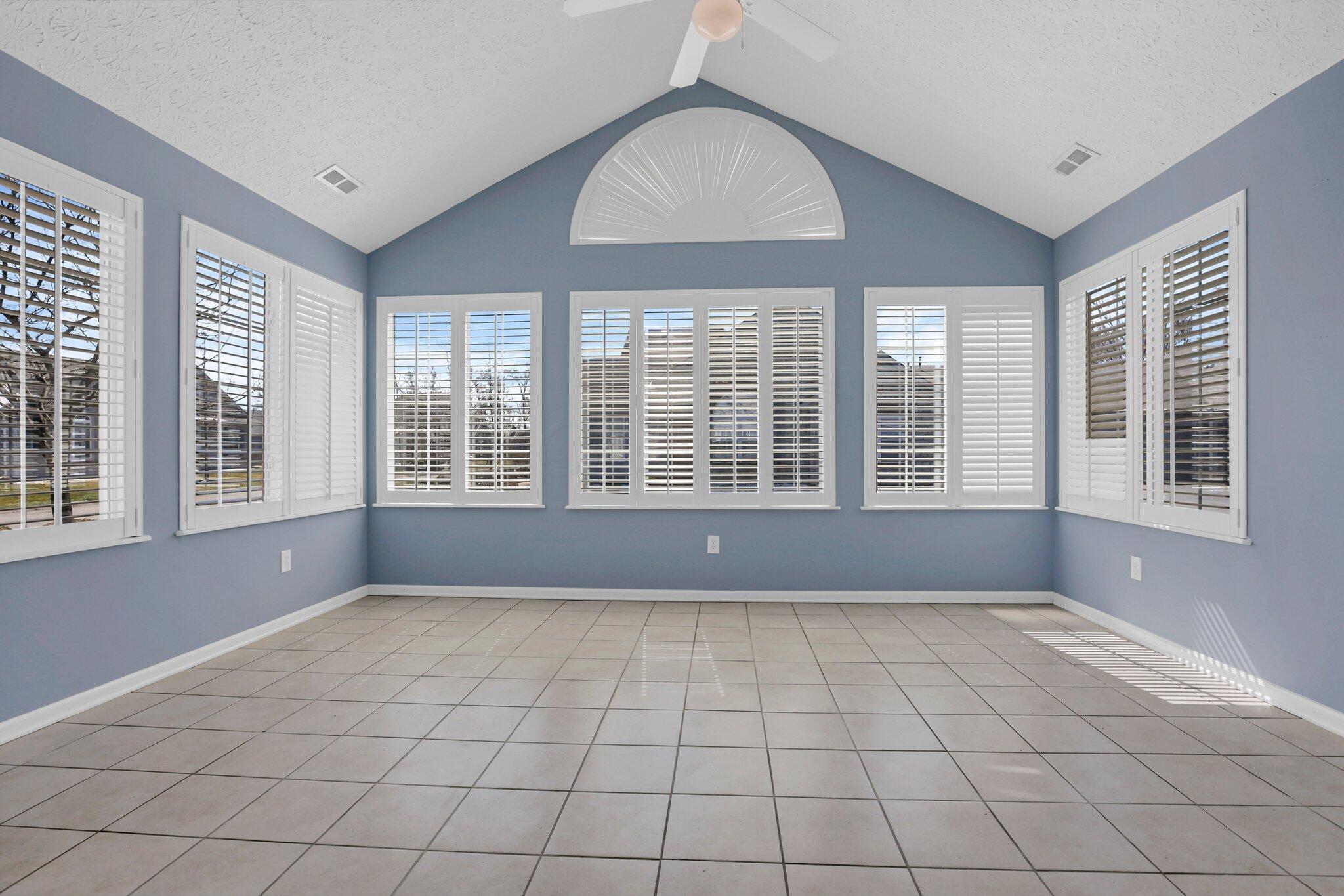 4223 Cobbler Road, Unit 16422 New Albany, OH 43054 - Photo 9 of 36 Vaulted sunroom with glass French doors. Heated and cooled.