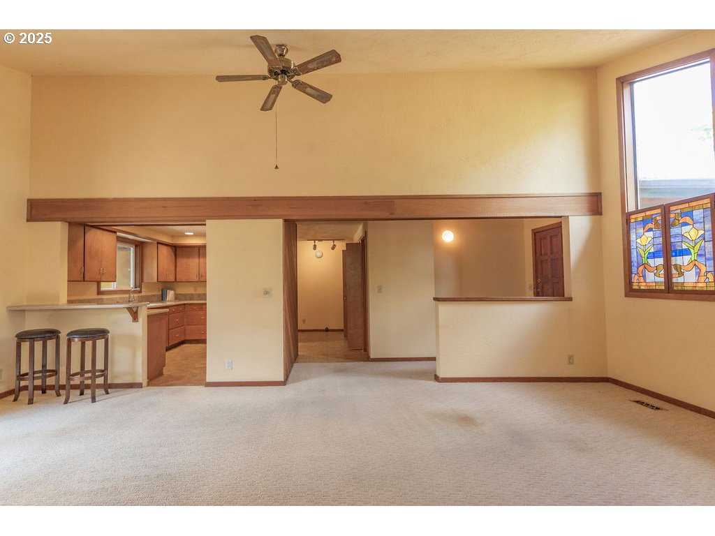 2116 Sally Way Eugene, OR 97401 - Photo 13 of 39 a view of an empty room with a window