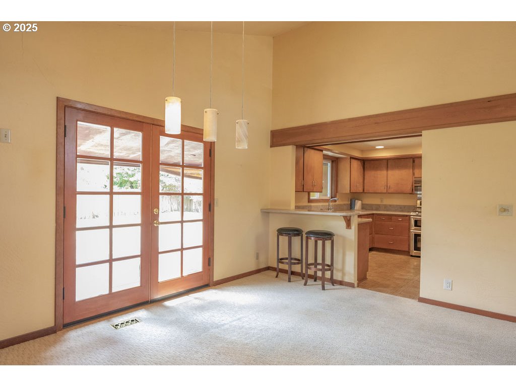 2116 Sally Way Eugene, OR 97401 - Photo 16 of 39 a room with furniture and a window