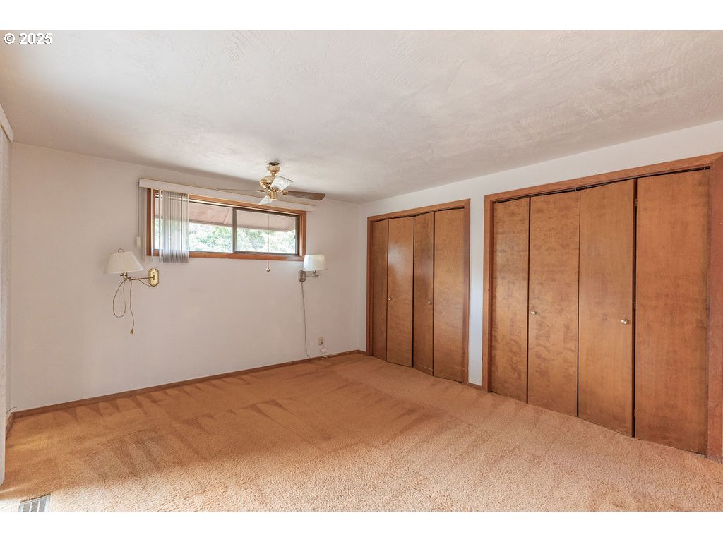 2116 Sally Way Eugene, OR 97401 - Photo 26 of 39 a big room with windows and closet