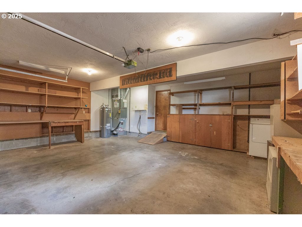 2116 Sally Way Eugene, OR 97401 - Photo 31 of 39 a view of a room with racks on the wall