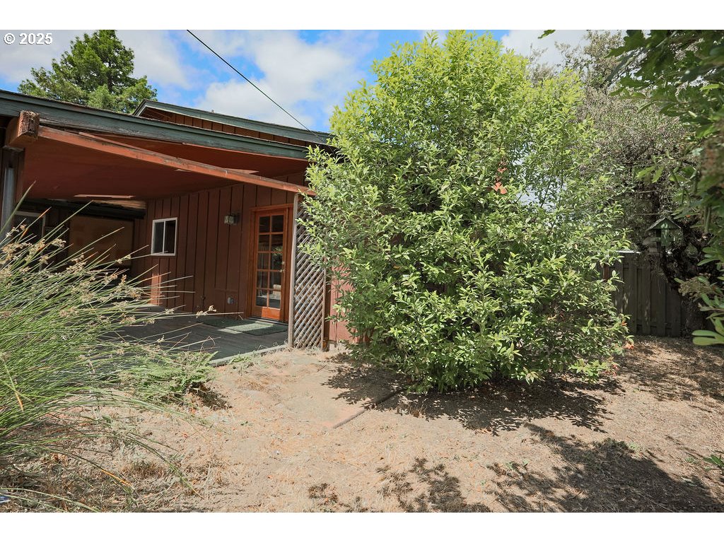 2116 Sally Way Eugene, OR 97401 - Photo 39 of 39 a view of a house with a yard