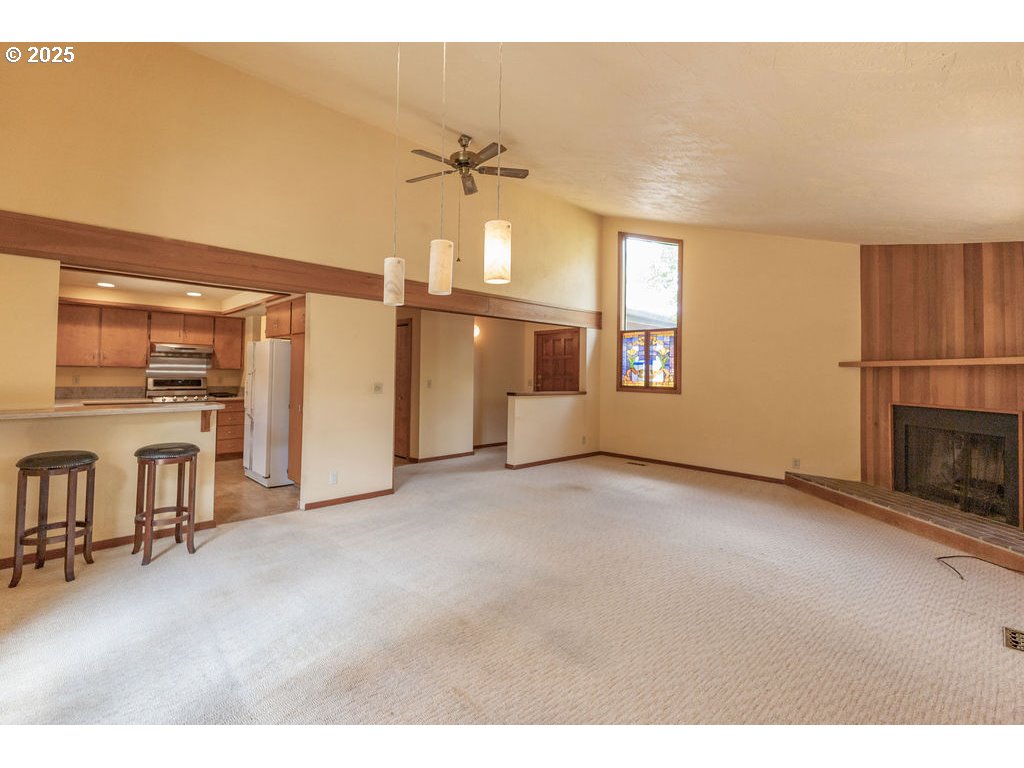 2116 Sally Way Eugene, OR 97401 - Photo 10 of 39 a view of a livingroom with a fireplace