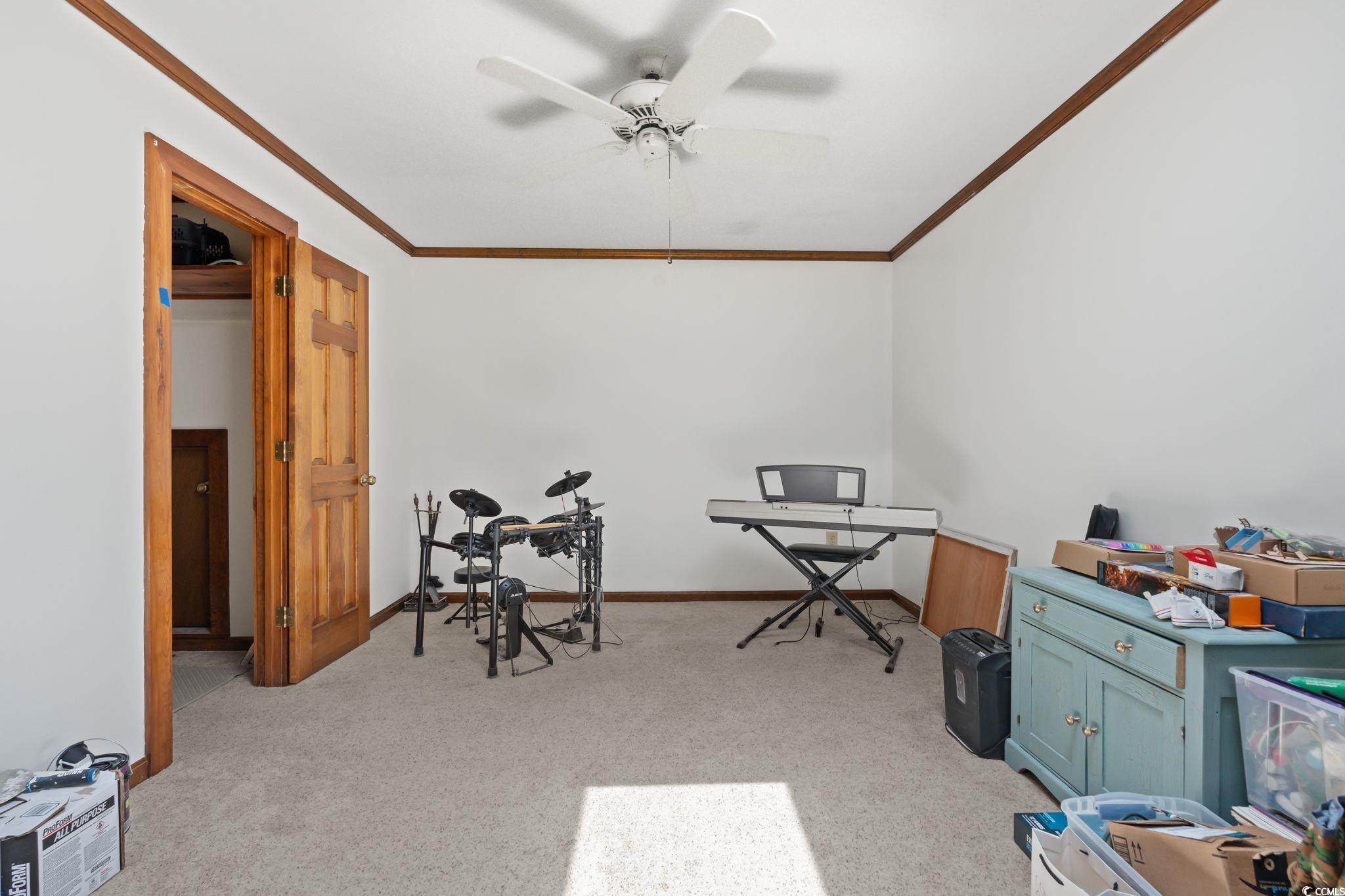 3533 Lighthouse Way Myrtle Beach, SC 29577 - Photo 29 of 40 Office space featuring crown molding, light colored carpet, and ceiling fan