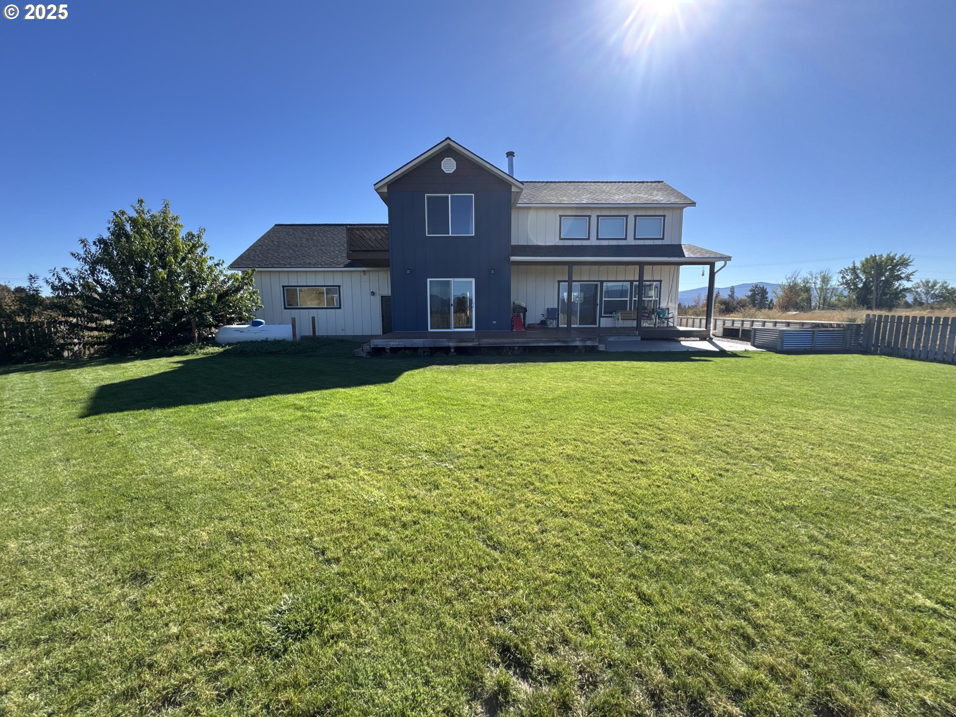 34786 Pleasant View Road Chiloquin, OR 97624 - Photo 18 of 48 a view of a house with a yard and a large tree