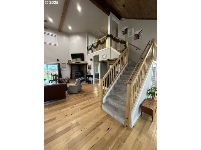 a kitchen with a sink appliances and cabinets