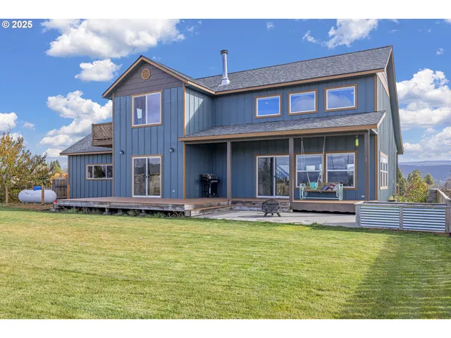 a view of a back yard from a room