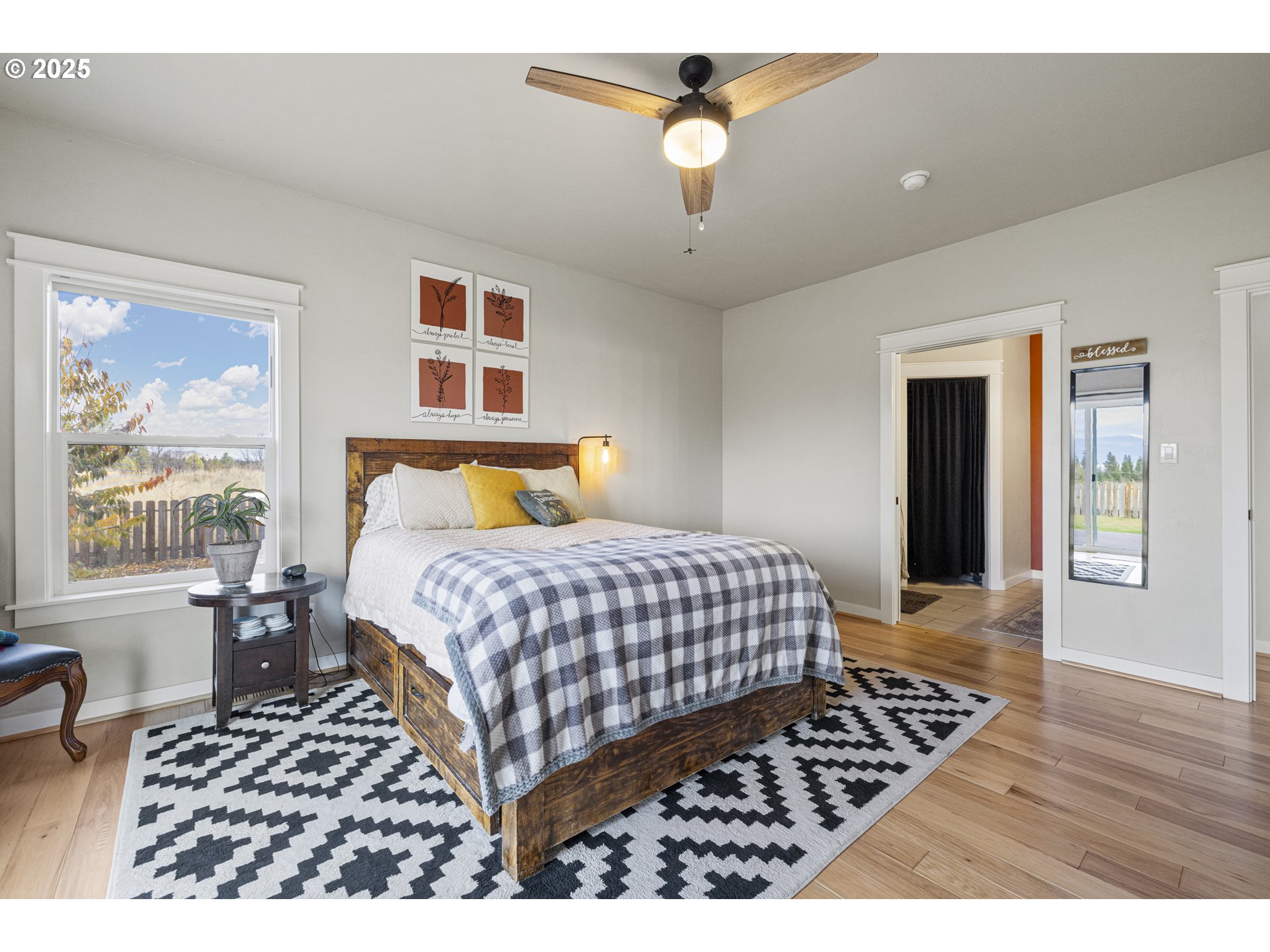 34786 Pleasant View Road Chiloquin, OR 97624 - Photo 46 of 48 a bedroom with a large bed and a chandelier